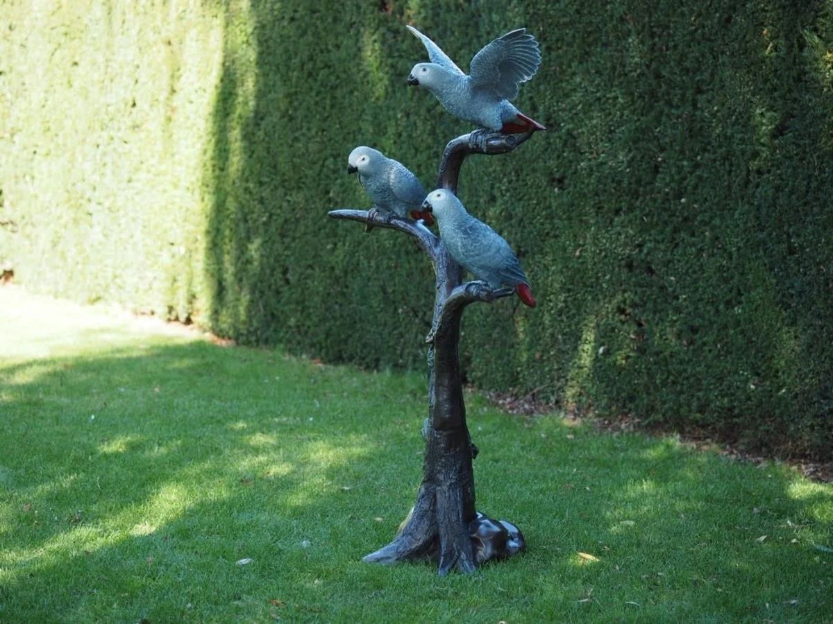 -Bronzefigur Papageien auf Baumstamm-
